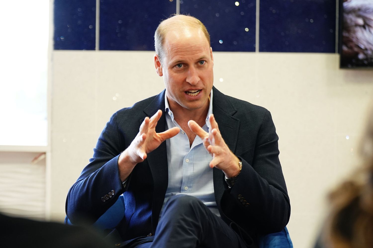 prince-william-sitting-in-chair-talking