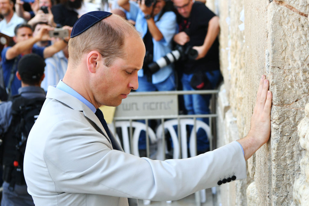 Prince William, Duke of Cambridge visits the Western Wall, Judaism's holiest place of prayer, in Jerusalem's Old City on June 28