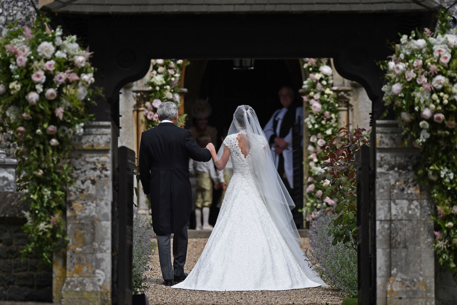 Pippa Middleton showed off her toned back but, unlike when she was a bridesmaid, kept her famous backside under wraps
