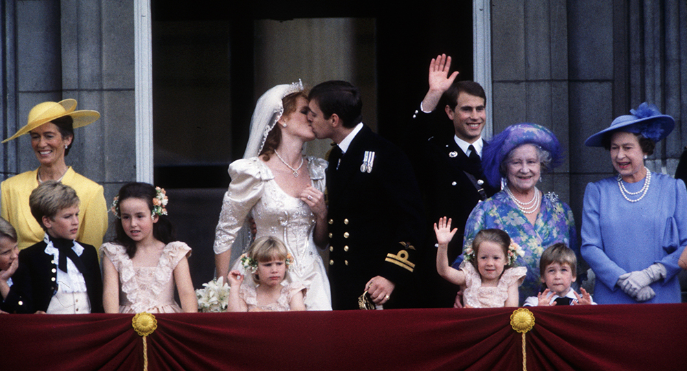 Sarah Ferguson and Prince Andrew share a kiss on their wedding in 1986.