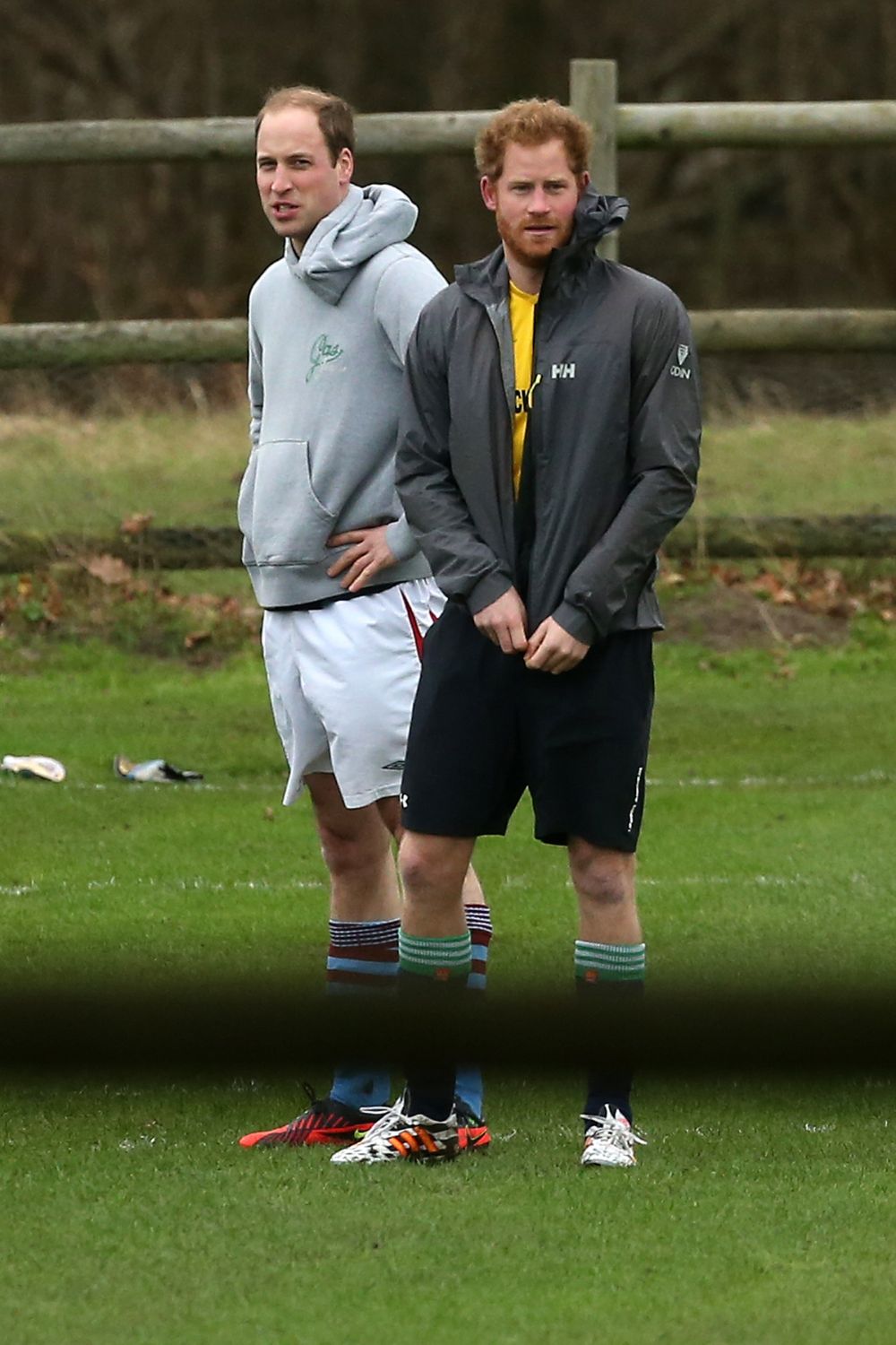 prince william and prince harry playing soccer