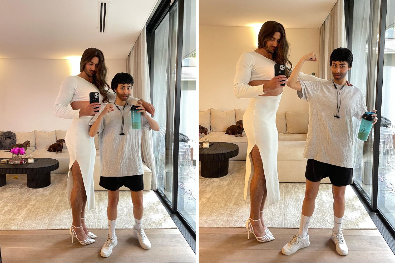 Two people in a living room mirror selfie: one in a white dress, the other in casual sportswear, both holding a drink.