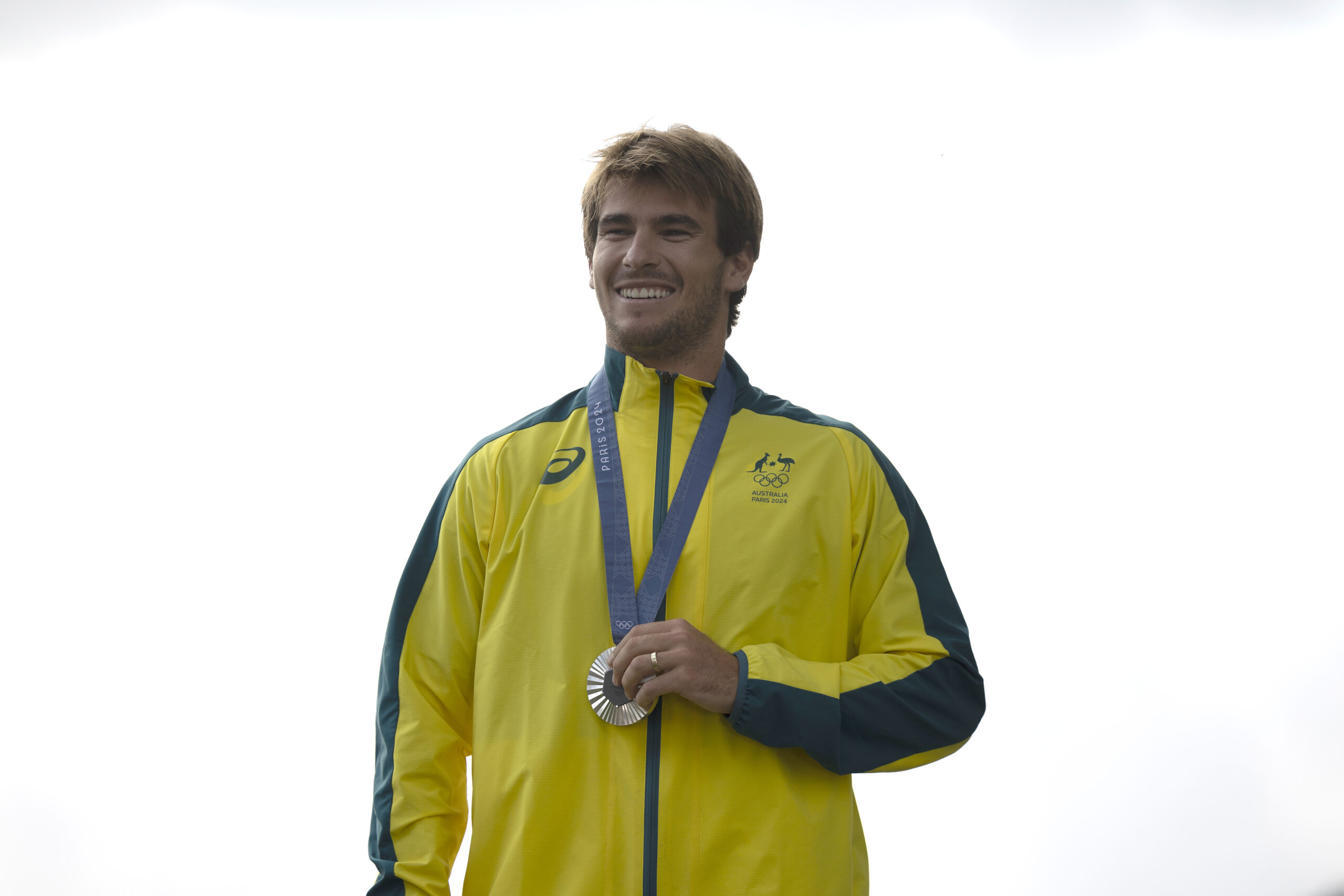 TEAHUPO'O, FRENCH POLYNESIA - AUGUST 05: Silver Medalist Jack Robinson of Team Australia poses on the podium during the Men's surfing medal ceremony on day nine of the Olympic Games Paris 2024 on August 05, 2024 in Teahupo'o, French Polynesia. (Photo by Ed Sloane/Getty Images)