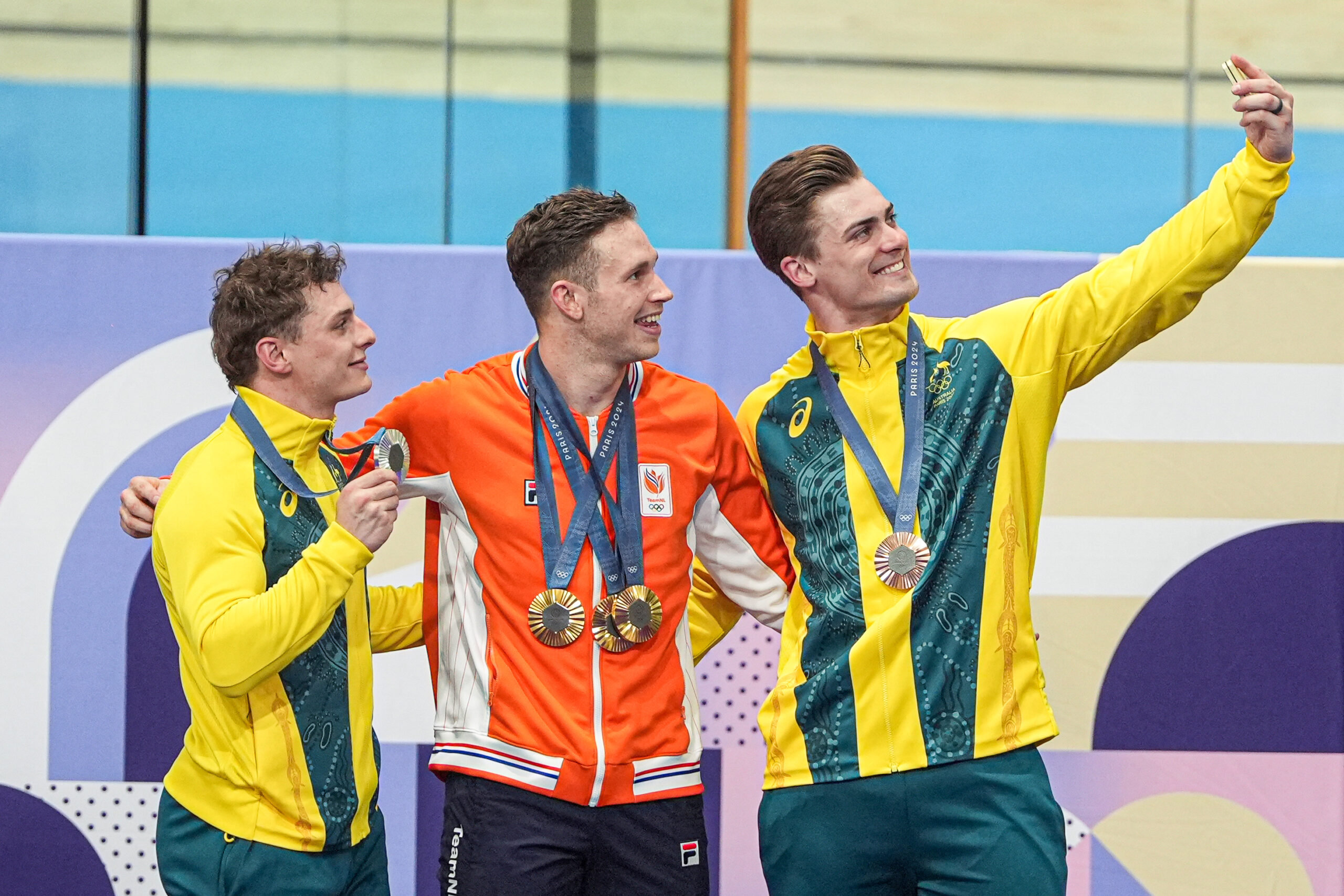 PARIS, FRANCE - AUGUST 11: Matthew Richardson of Australia, Harrie Lavreysen of the Netherlands, Matthew Glaetzer of Australia celebrate during the Men's Keirin - Medal ceremony during Day 16 of Cycling - Track - Olympic Games Paris 2024 at Saint-Quentin-en-Yvelines Velodrome on August 11, 2024 in Paris, France. (Photo by Joris Verwijst/BSR Agency/Getty Images)