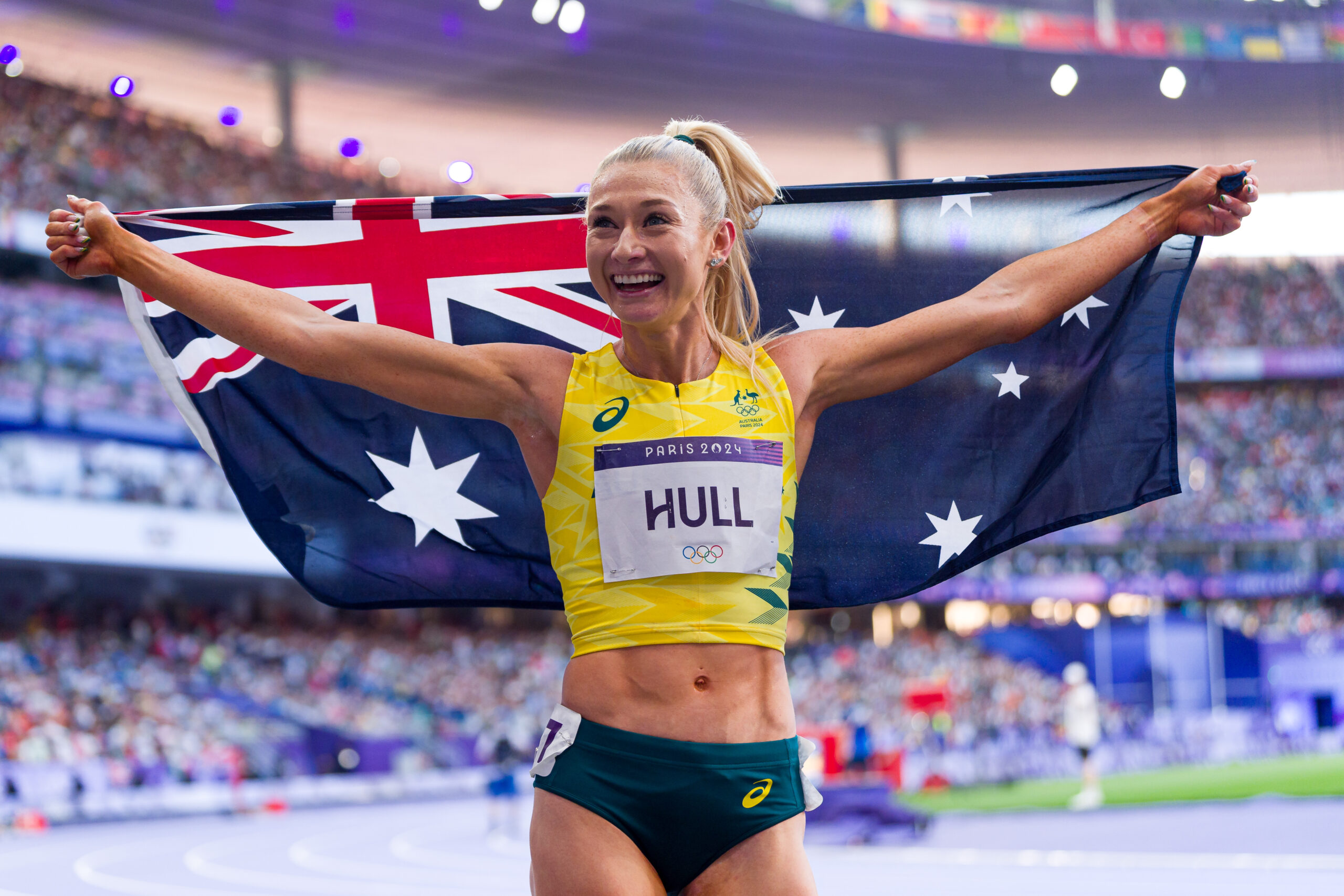 PARIS, FRANCE - AUGUST 10: Silver medalist Jessica Hull of Team Australia celebrates following the Women's 1500m Final on day fifteen of the Olympic Games Paris 2024 at Stade de France on August 10, 2024 in Paris, France. (Photo by Andy Cheung/Getty Images)