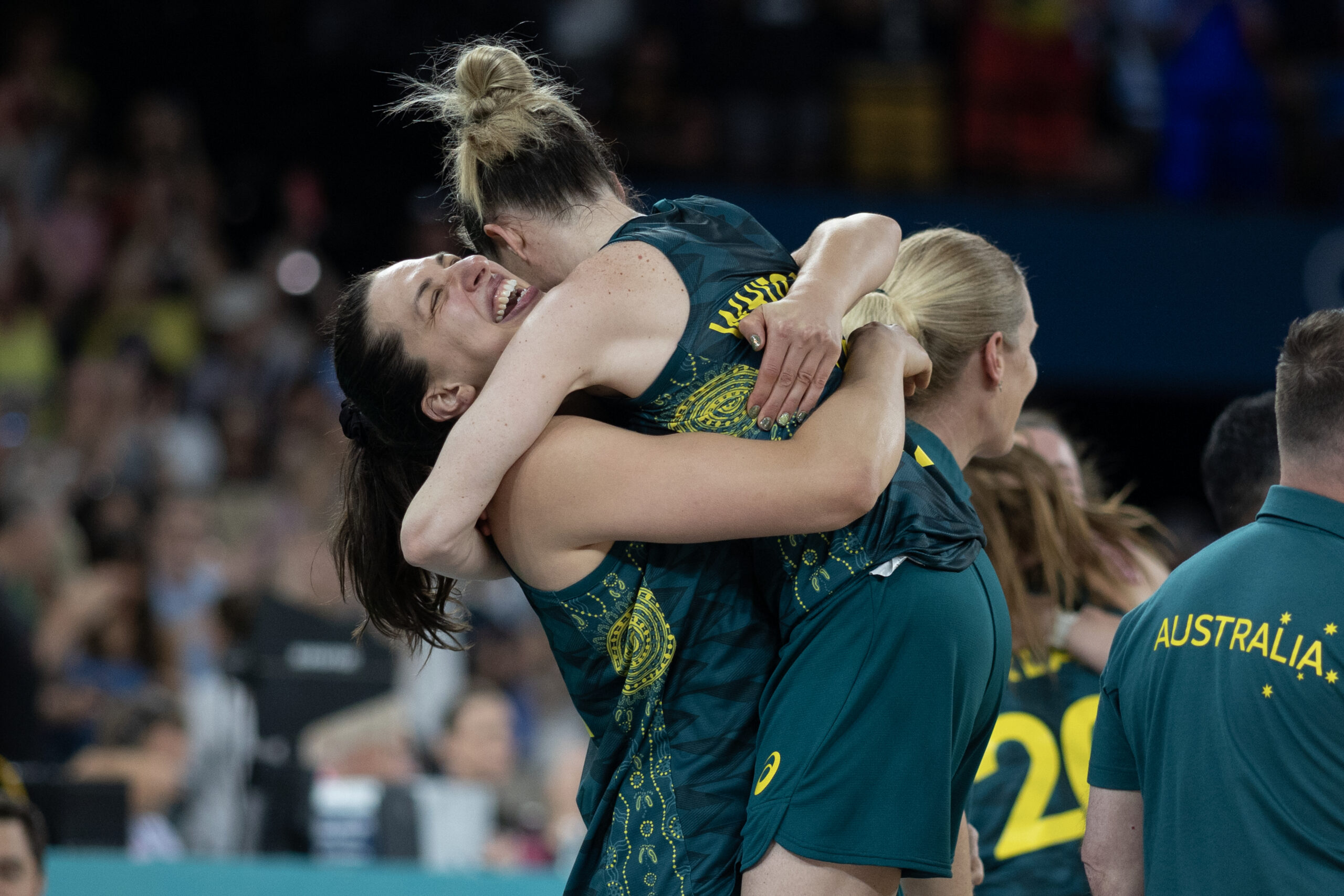 PARIS, FRANCE: AUGUST 11: Marianna Tolo #14 of Team Australia and Sami Whitcomb #32 of Team Australia embrace after the team's bronze medal victory during the Australia V Belgium, Women's Basketball Bronze Medal Game at the Bercy Arena during the Paris 2024 Summer Olympic Games on August 11th, 2024 in Paris, France. (Photo by Tim Clayton/Corbis via Getty Images)