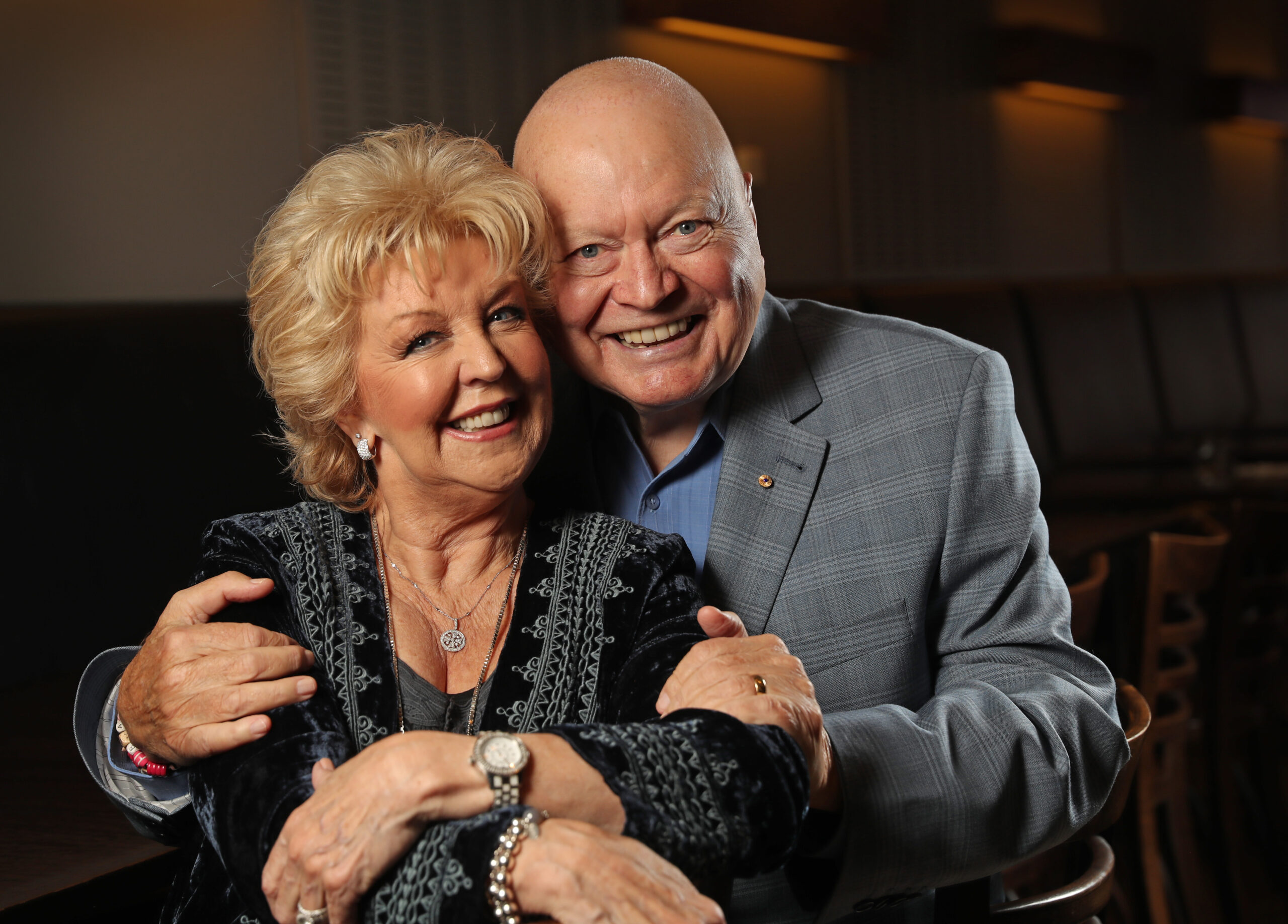 Patti and Bert Newton hugging.